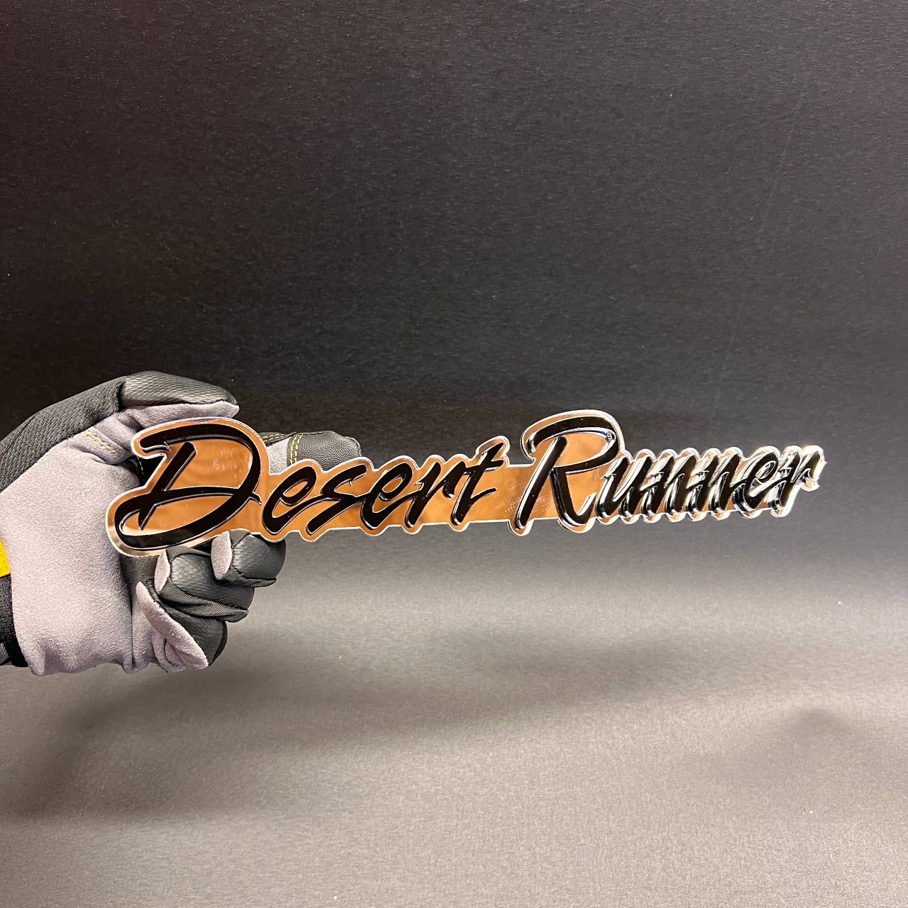 Desert Runner Car Badge Fender Emblem in black and gold finish
