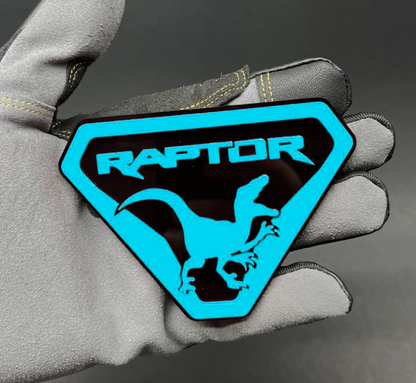 tailgate dinosaur badge on lifted truck offroad build
