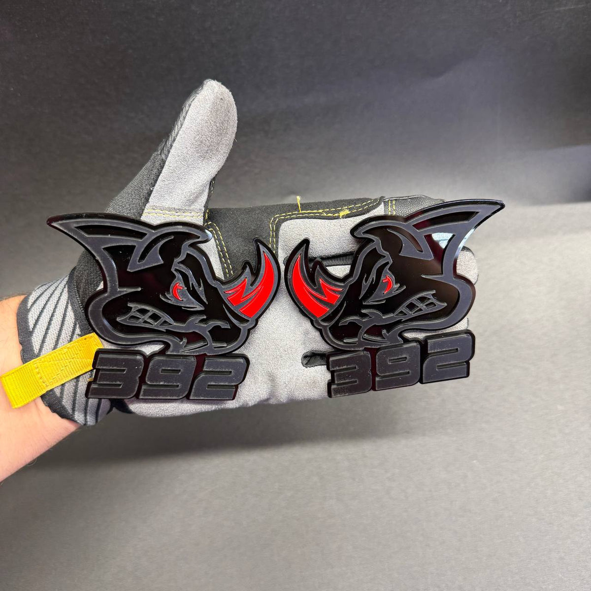 Custom 392 Rhino car emblem featuring detailed rhinoceros head graphics, red horn highlights and bold black 392 lettering for Mopar enthusiasts.