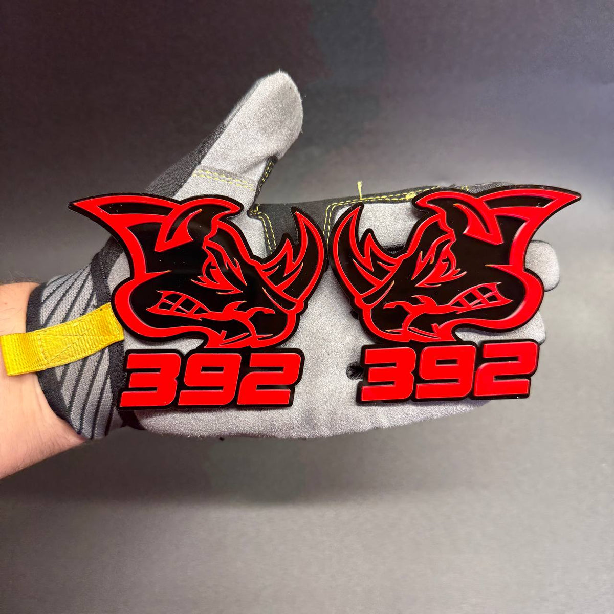 Custom 392 Rhino fender badge with red rhinoceros outline and detailed black face, designed for Dodge Charger and Challenger muscle car enthusiasts.