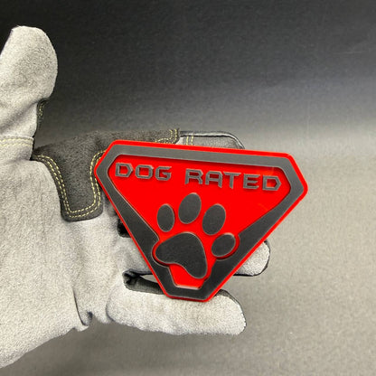 Custom Dog Rated 4x4 vehicle badge featuring a black paw print symbol and red background for Ford Bronco, Jeep and off-road truck enthusiasts.