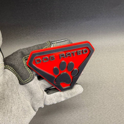 Custom Dog Rated truck emblem featuring a red shield background and black dog paw design for RAM 1500, 2500 and 3500 accessories.