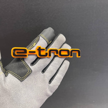 E-TRON car badge fender emblem in orange and black finish