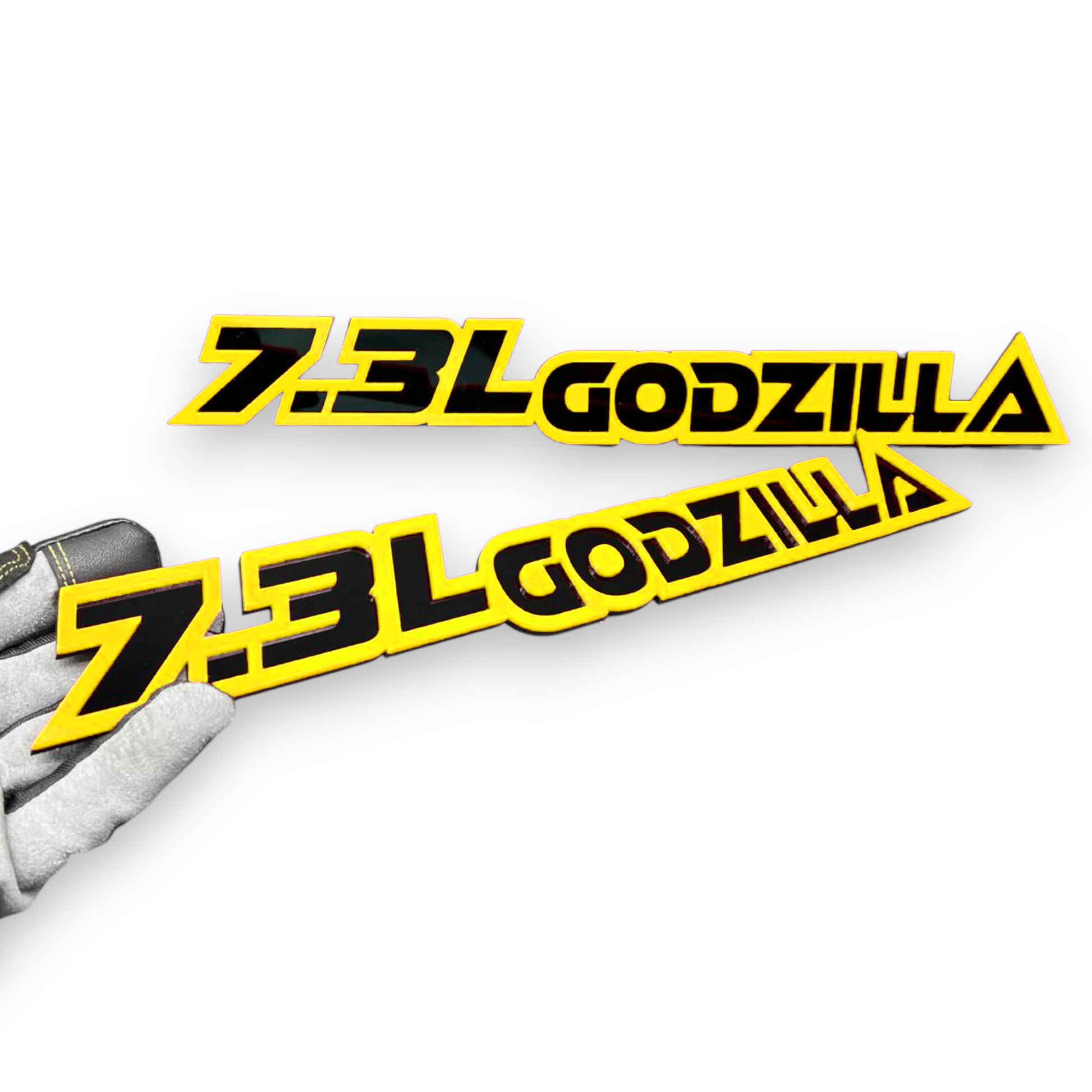 Ford 7.3 engine emblem with Godzilla dinosaur styling