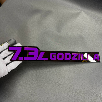 Custom Ford 7.3L Godzilla badge for F250, F350, and Super Duty truck side panels.