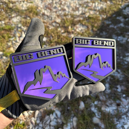 Big Bend mountain fender badge with black raised lettering and reflective purple background for Ford Bronco customization.