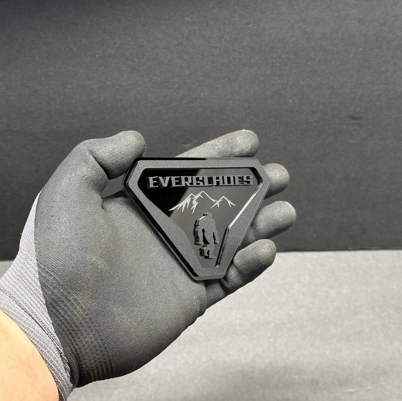 Back view of Everglades Bigfoot acrylic badge for Ford Bronco with mounting surface