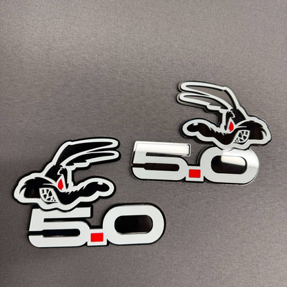 Mustang GT Coyote 5.0 gray red dot emblem featuring bold 5.0 lettering and stylized coyote head for exterior automotive styling.