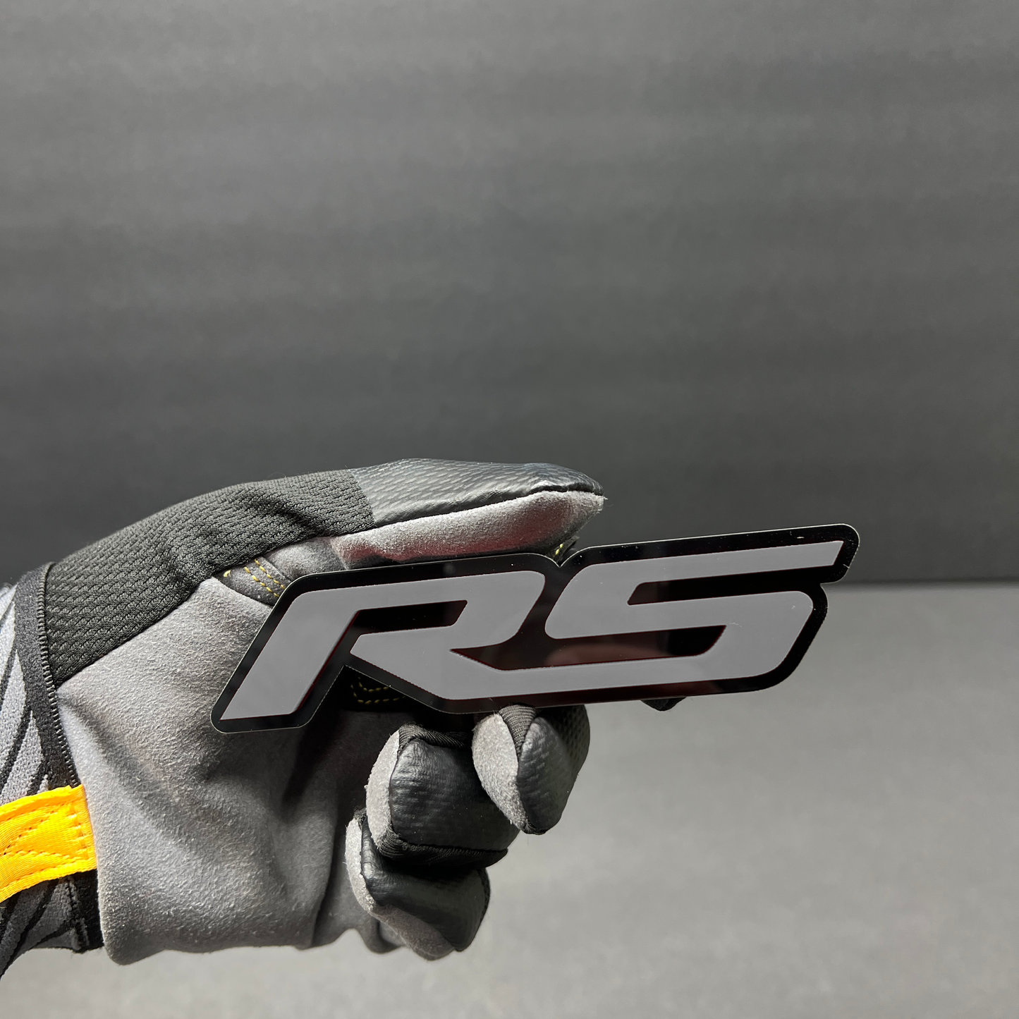 RS text emblem for Renault Megane RS performance styling.