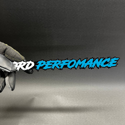 Ford Performance aftermarket car badge with glossy red finish