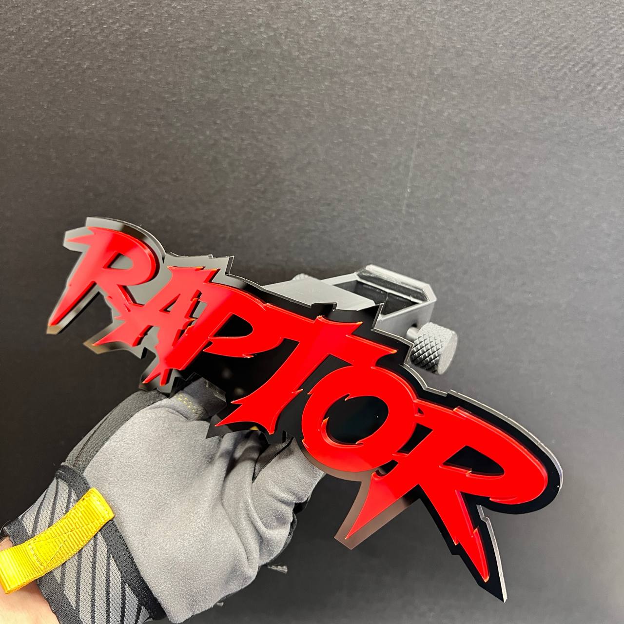 RAPTOR decorative hitch receiver plug for truck exterior customization