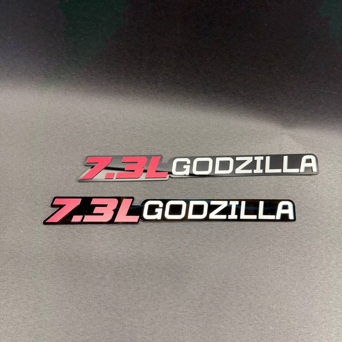 Ford Super Duty 7.3L Godzilla gas V8 custom truck badge with layered laser-cut design and adhesive backing.