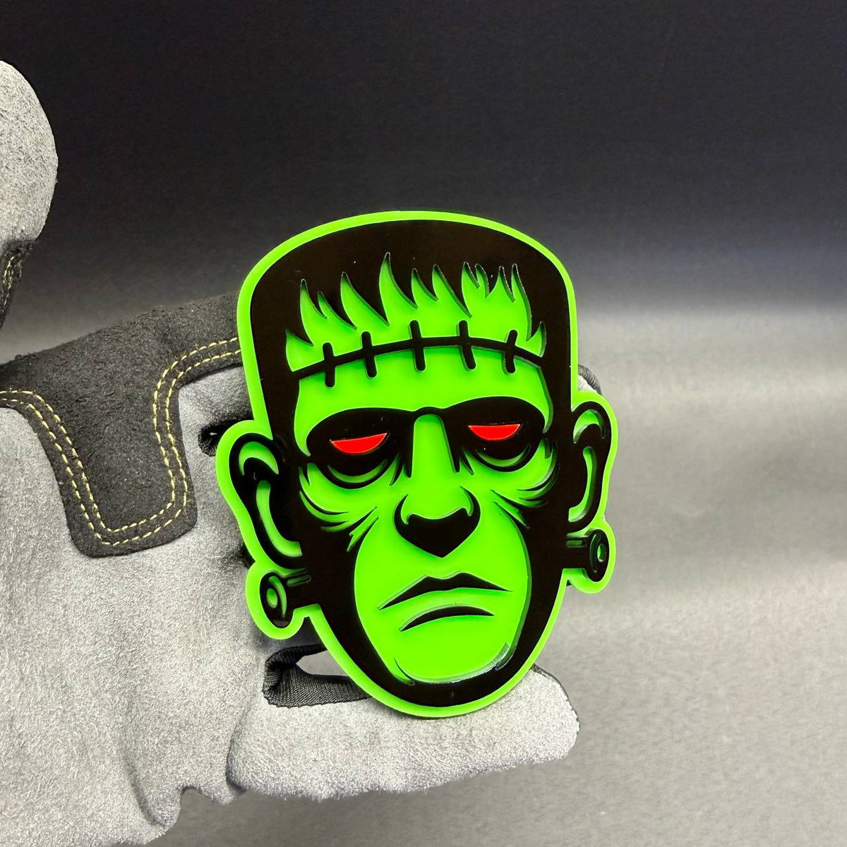 1. Frankenstein Halloween custom car badge with green face black details and red eyes for Jeep Ford Chevy and Ram