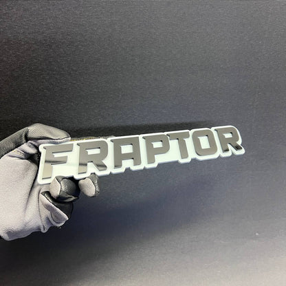 FRAPTOR text badge car emblem designed for fender, tailgate, or exterior vehicle decoration.