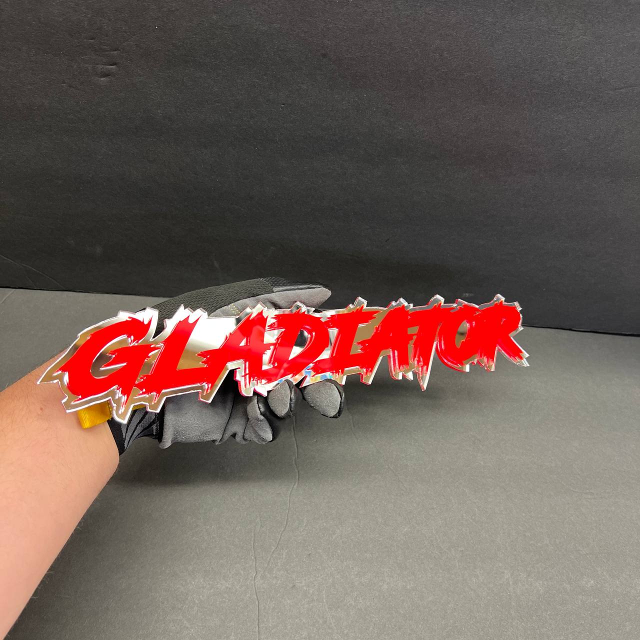 Red white GLADIATOR car badge fender emblem with bold rugged truck look.