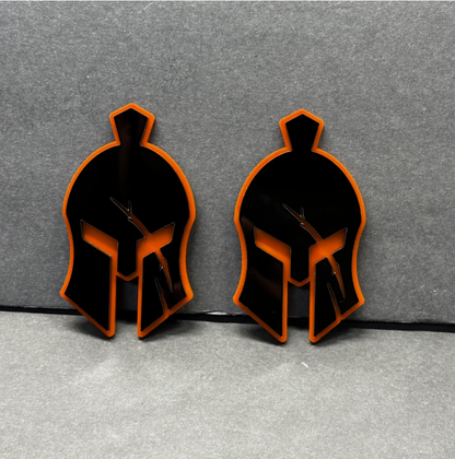 Il Gladiatore car badge with black and red warrior helmet design for Ford Mustang, F-150 and Bronco vehicles