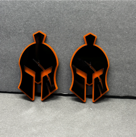 Il Gladiatore car badge with black and red warrior helmet design for Ford Mustang, F-150 and Bronco vehicles