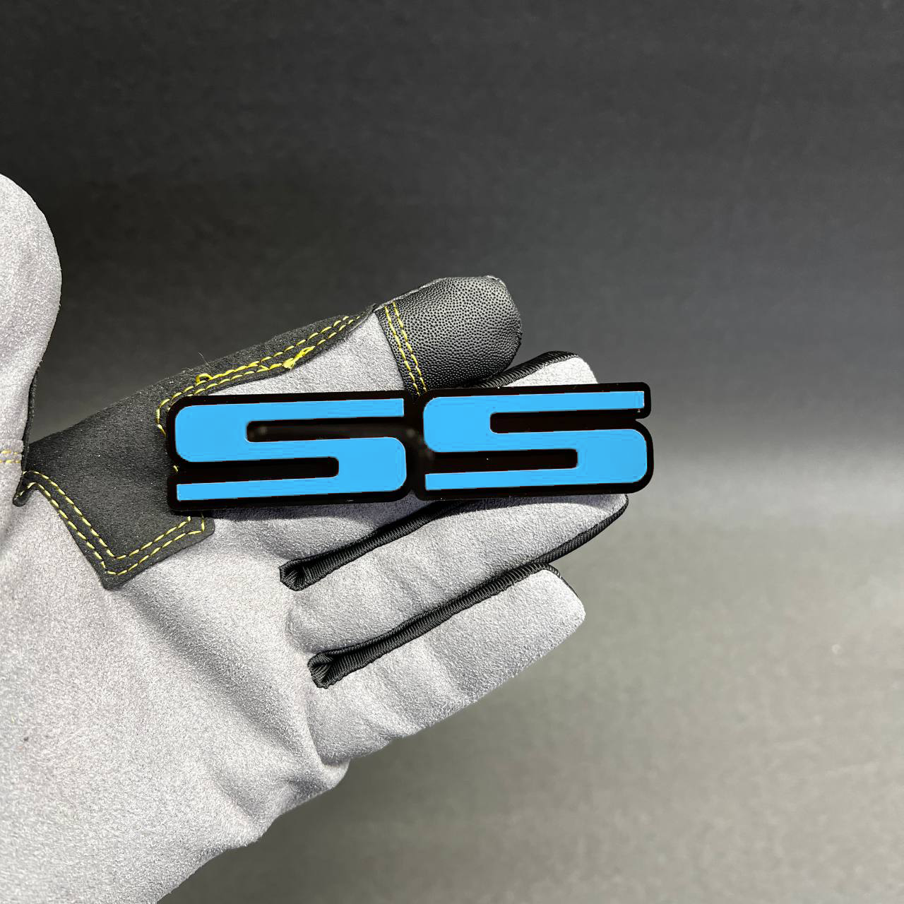 Gloss red and black SS emblem for Chevrolet Impala, Nova, Camaro, and classic muscle builds.
