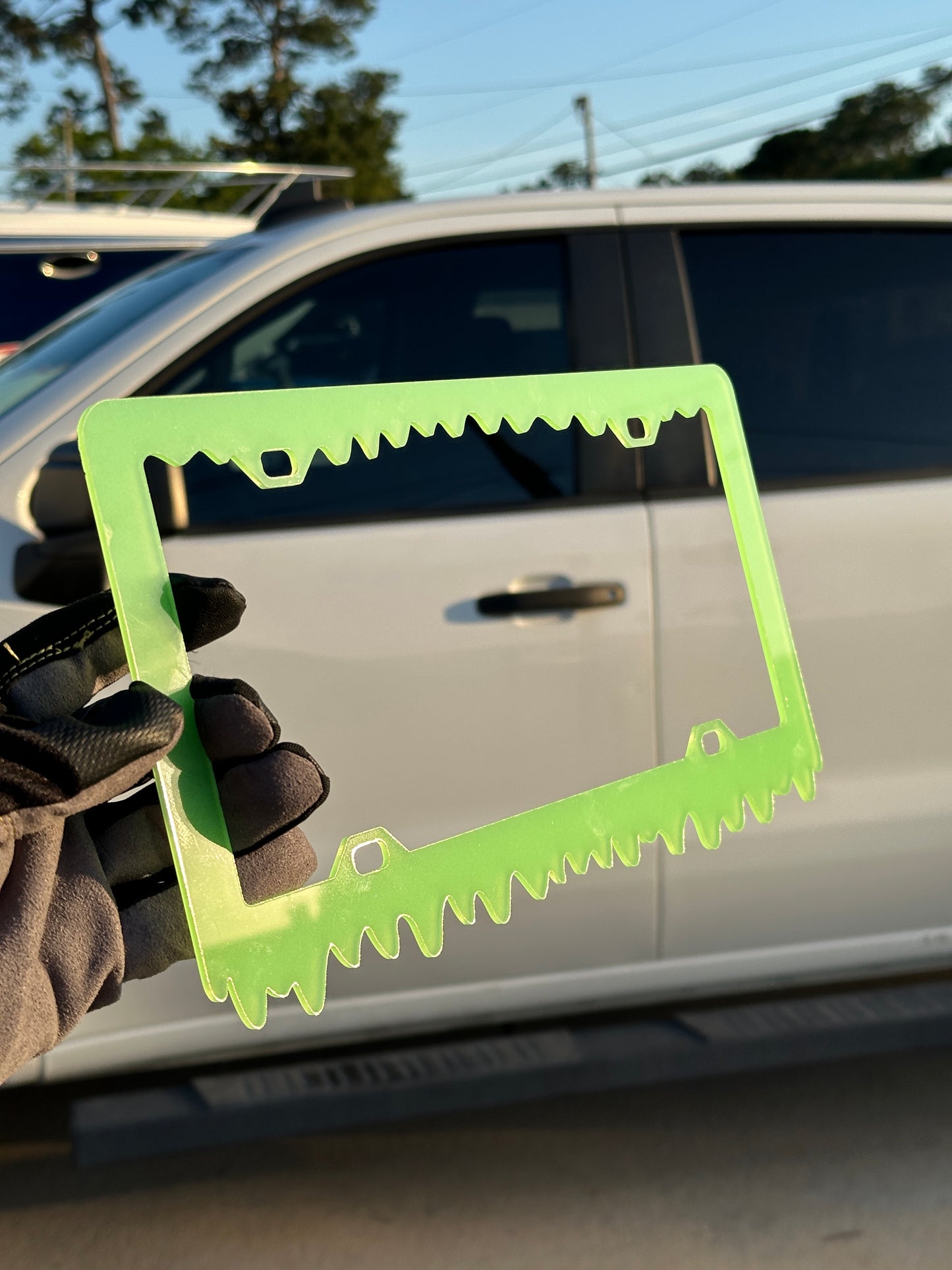 Glow in the dark license plate frame with bright green night glow