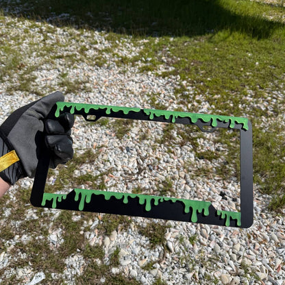 Glowing dripping slime car license plate frame with Halloween style design