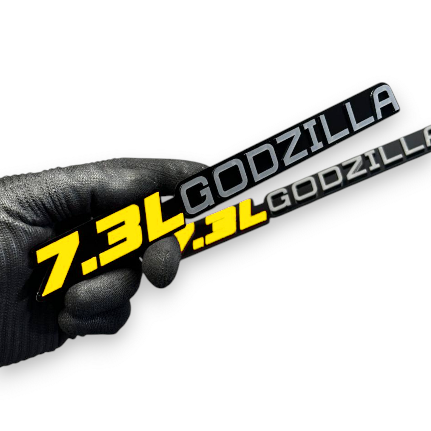 Ford 7.3 engine emblem with Godzilla dinosaur styling