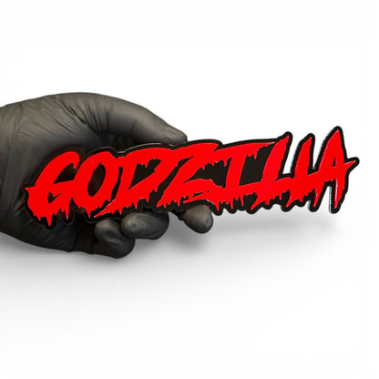 Custom Godzilla horror text emblem for Silverado truck build