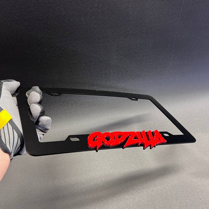 Black and red Godzilla inspired car frame with bold 3D text design