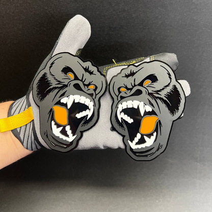 Bold roaring gorilla Car Badge Fender Emblem with layered gray, black, white, and pink color design.