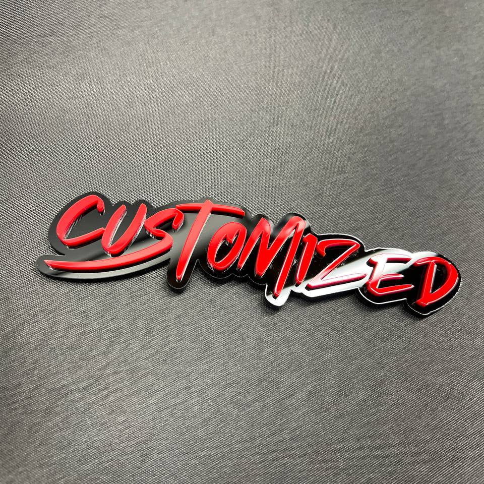 Personalized vehicle emblem with graffiti lettering