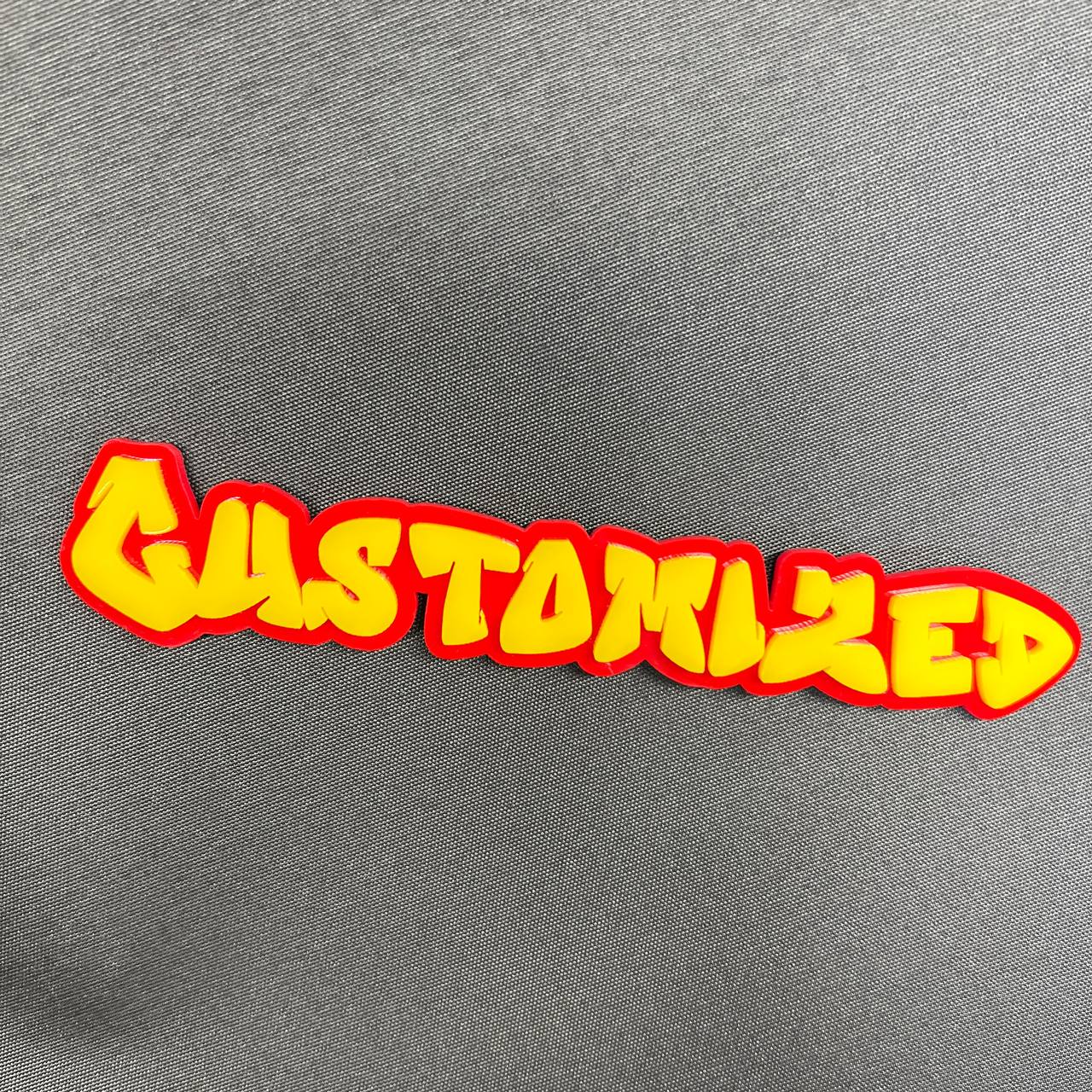 Graffiti style custom word emblem with bright layered colors.