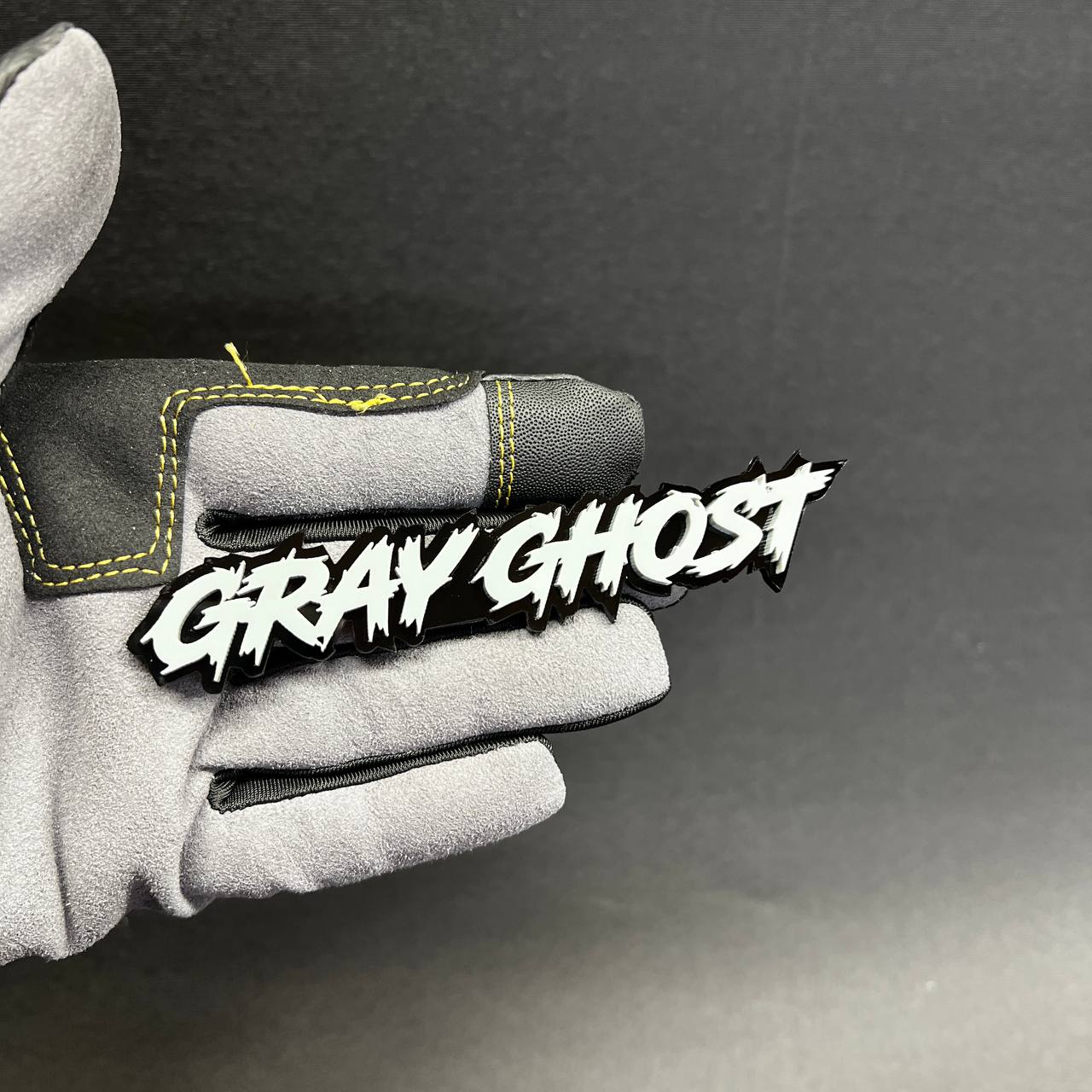 Gray Ghost Car Badge Fender Emblem in white lettering with black base for car exterior decal