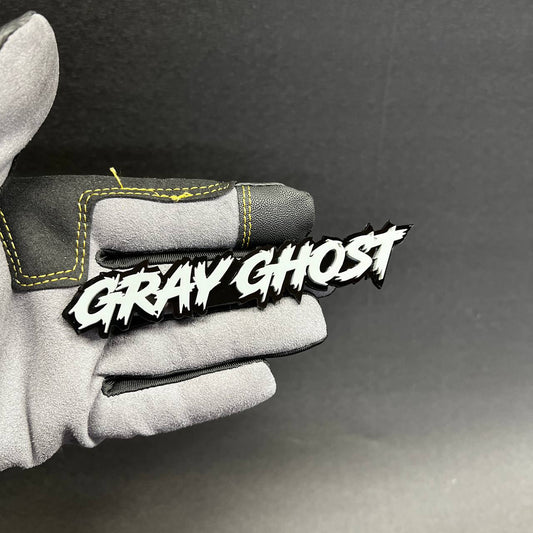 Gray Ghost Car Badge Fender Emblem in white lettering with black base for car exterior decal