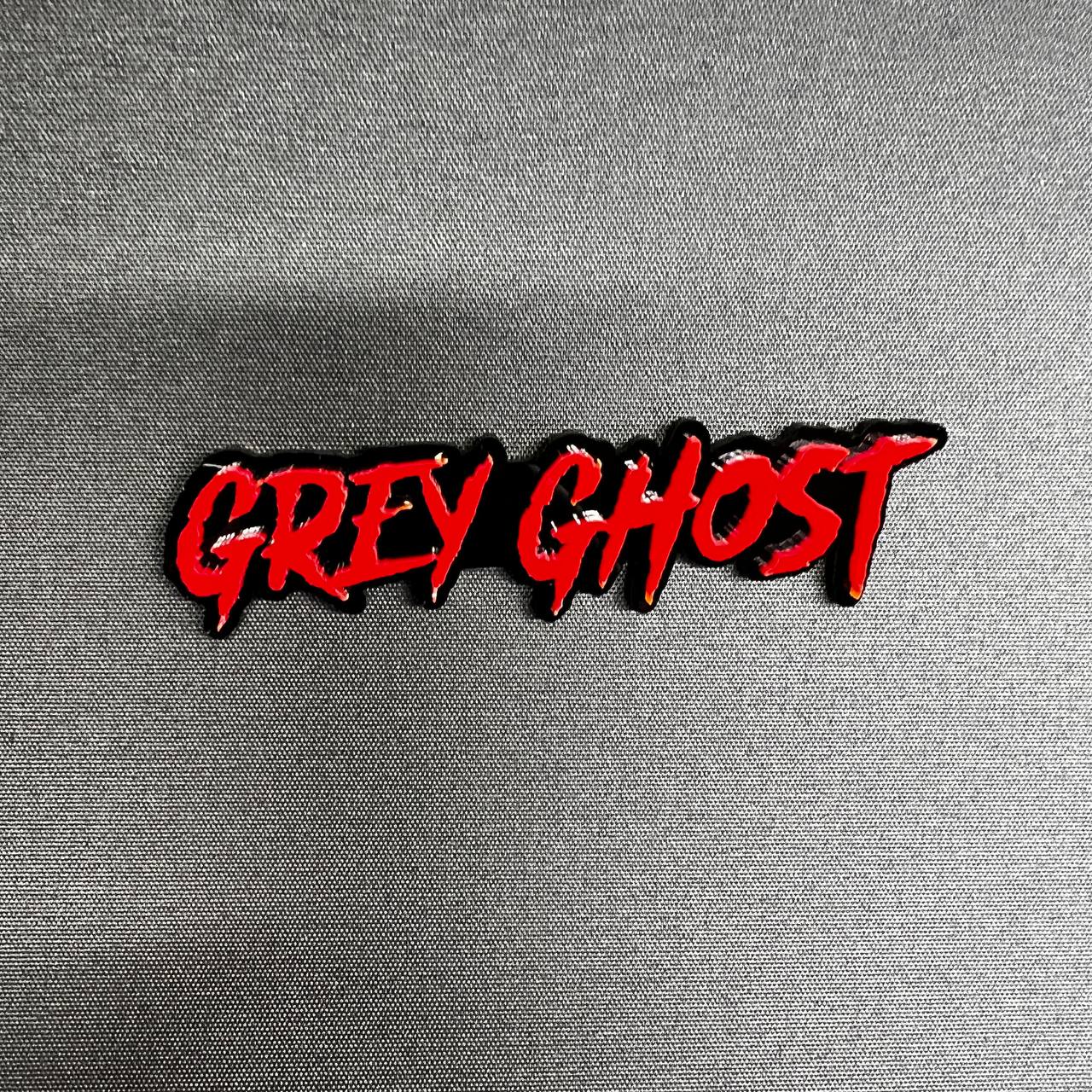 Performance inspired Grey Ghost acrylic car badge decal with aggressive script font for custom truck and muscle vehicle appearance
