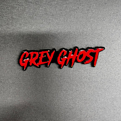 Performance inspired Grey Ghost acrylic car badge decal with aggressive script font for custom truck and muscle vehicle appearance