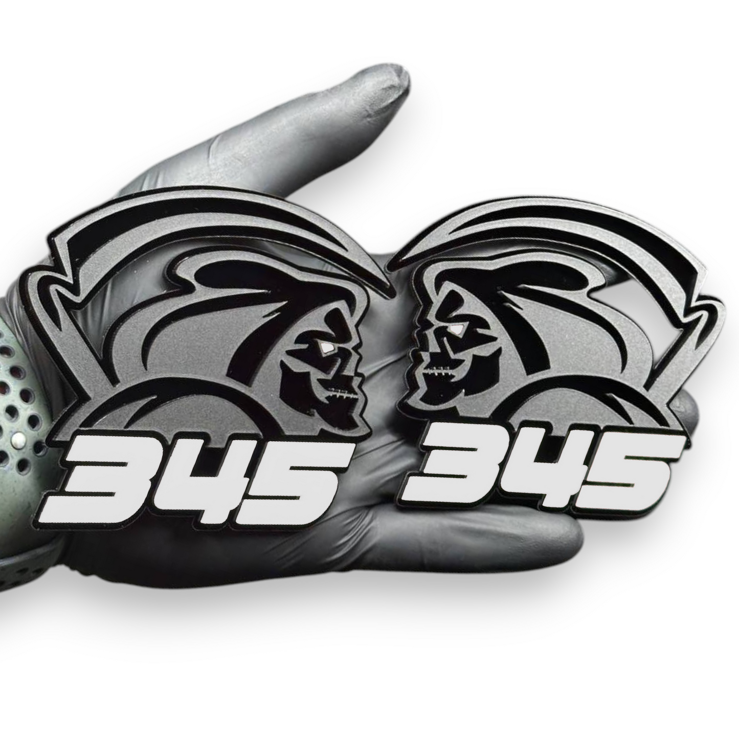 Reaper 345 emblem on GMC Sierra tailgate