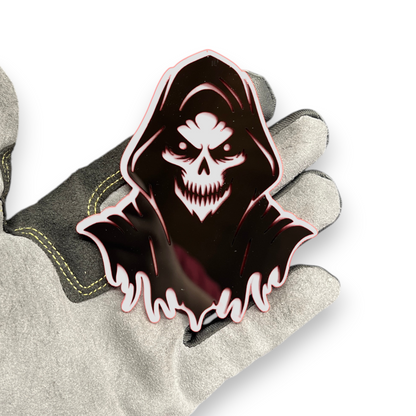 Reaper badge shown as custom vehicle fender emblem with hooded skull design