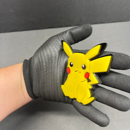 Picachu inspired cartoon yellow character car badge made from layered acrylic