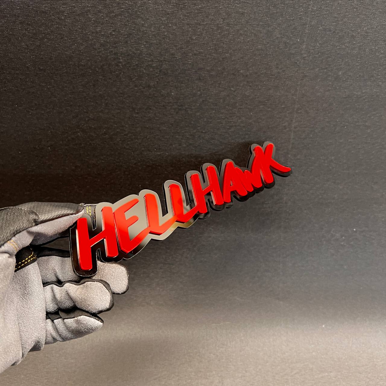 Red Hell Hawk automotive text badge with glossy finish and 3M backing