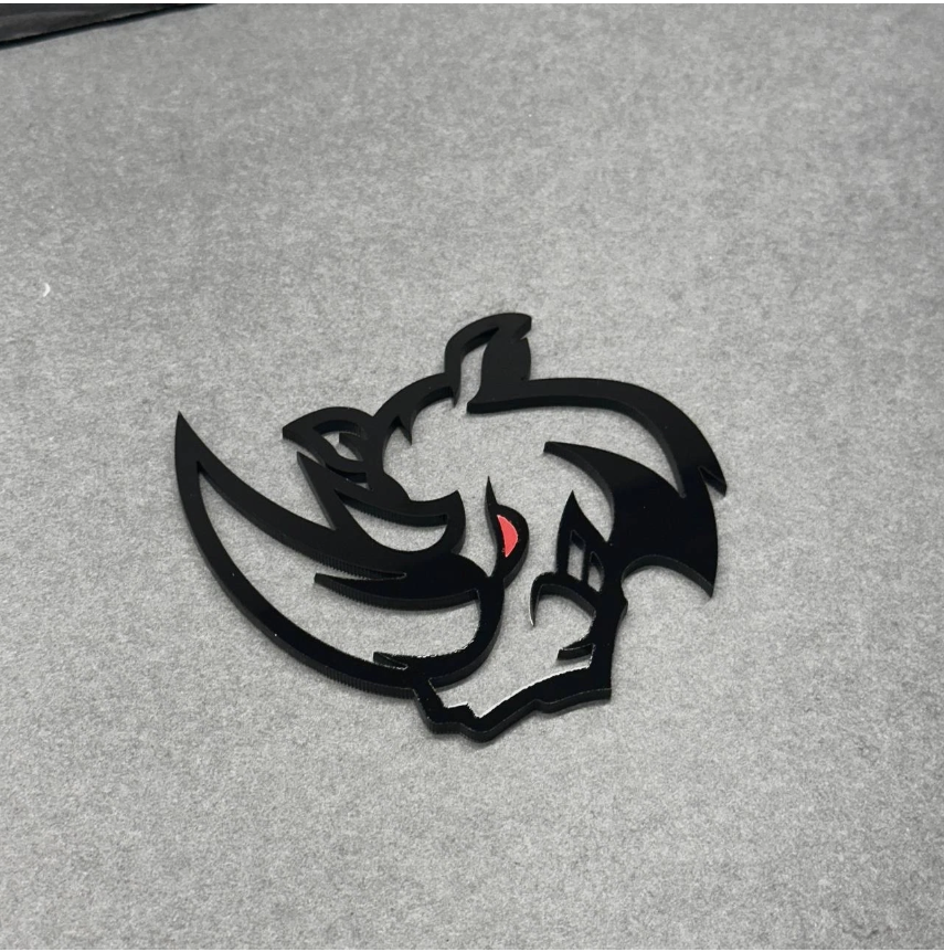 Hell Rhino Red Eye truck badge exterior accessory for Toyota Tacoma, Tundra, Nissan Frontier and Titan