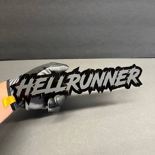 Automotive acrylic text emblem with sharp aggressive lettering style