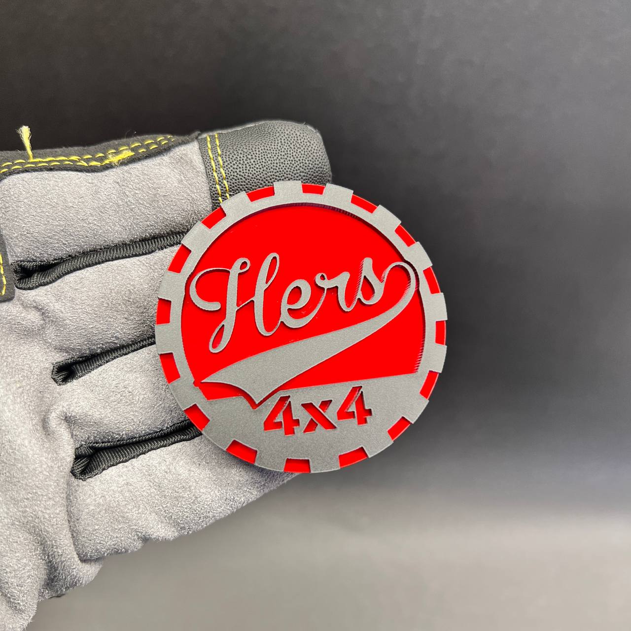 HERS 4x4 red and silver car badge with circular off-road design