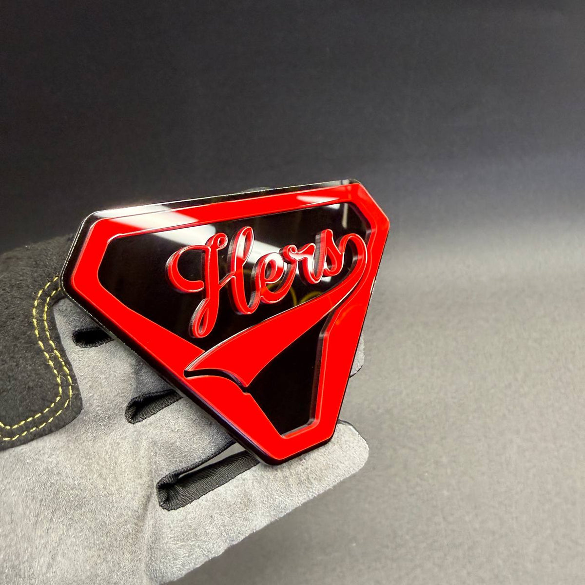 Hers custom automotive badge featuring raised red script lettering, stylish trunk and tailgate decoration for cars, trucks, and SUVs.