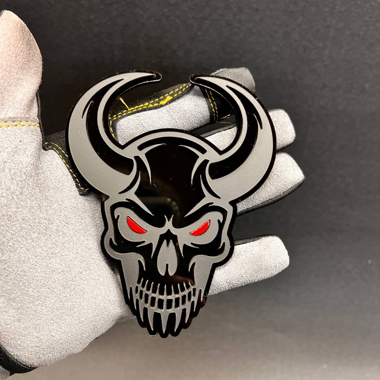 Demon Skull exterior car badge with glossy black backing and gray top layer