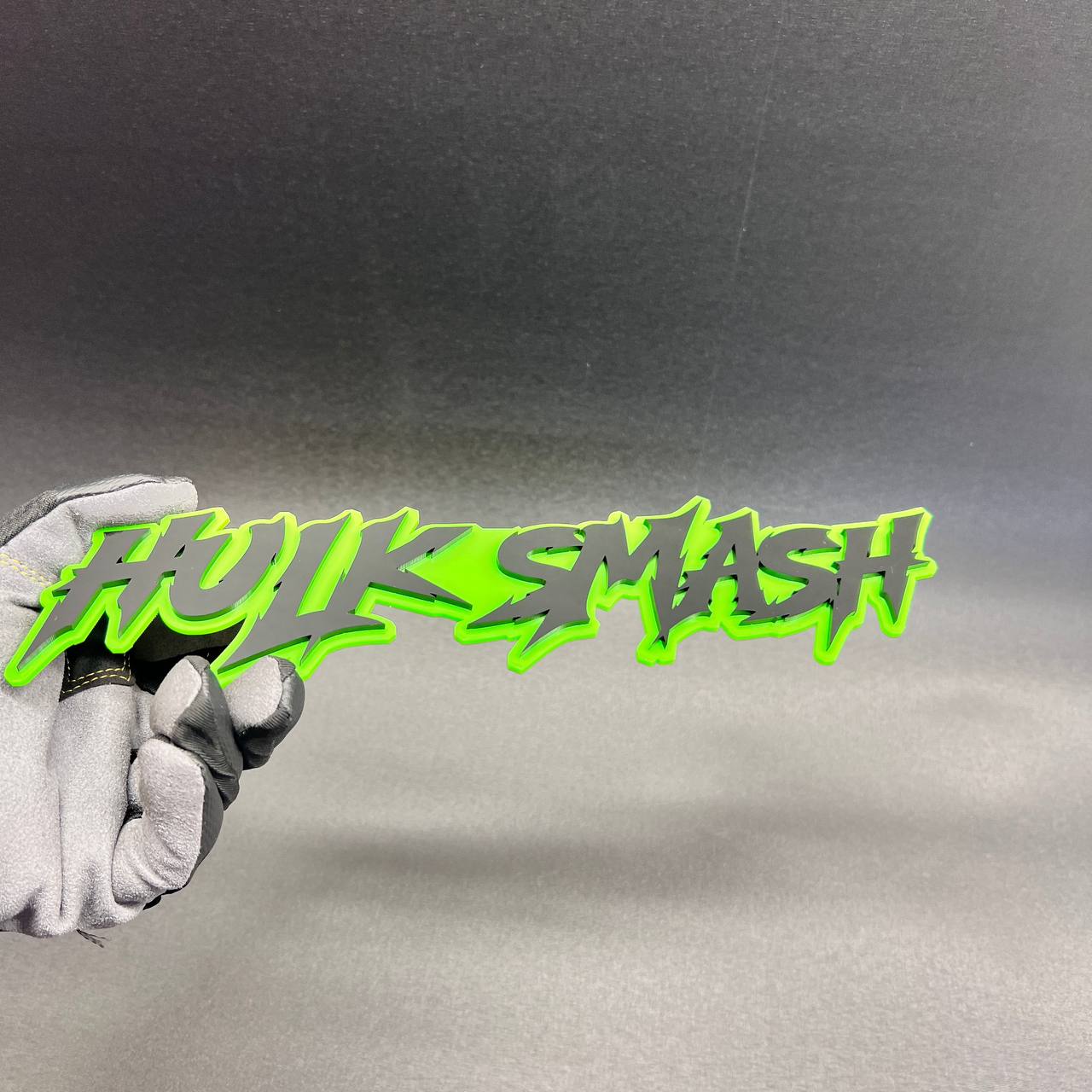 HULK SMASH green and black text car badge emblem