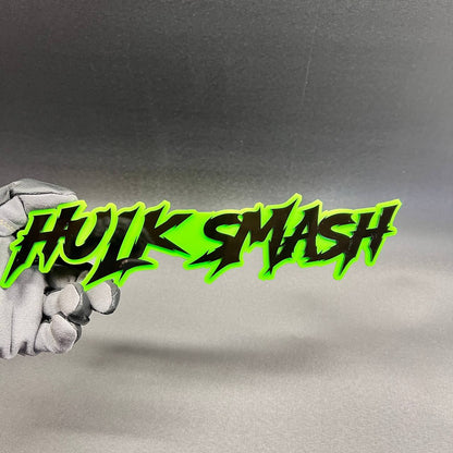 HULK SMASH automotive badge with bright green background and black lettering