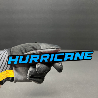 Hurricane exterior badge with clean white lettering and gloss black finish.