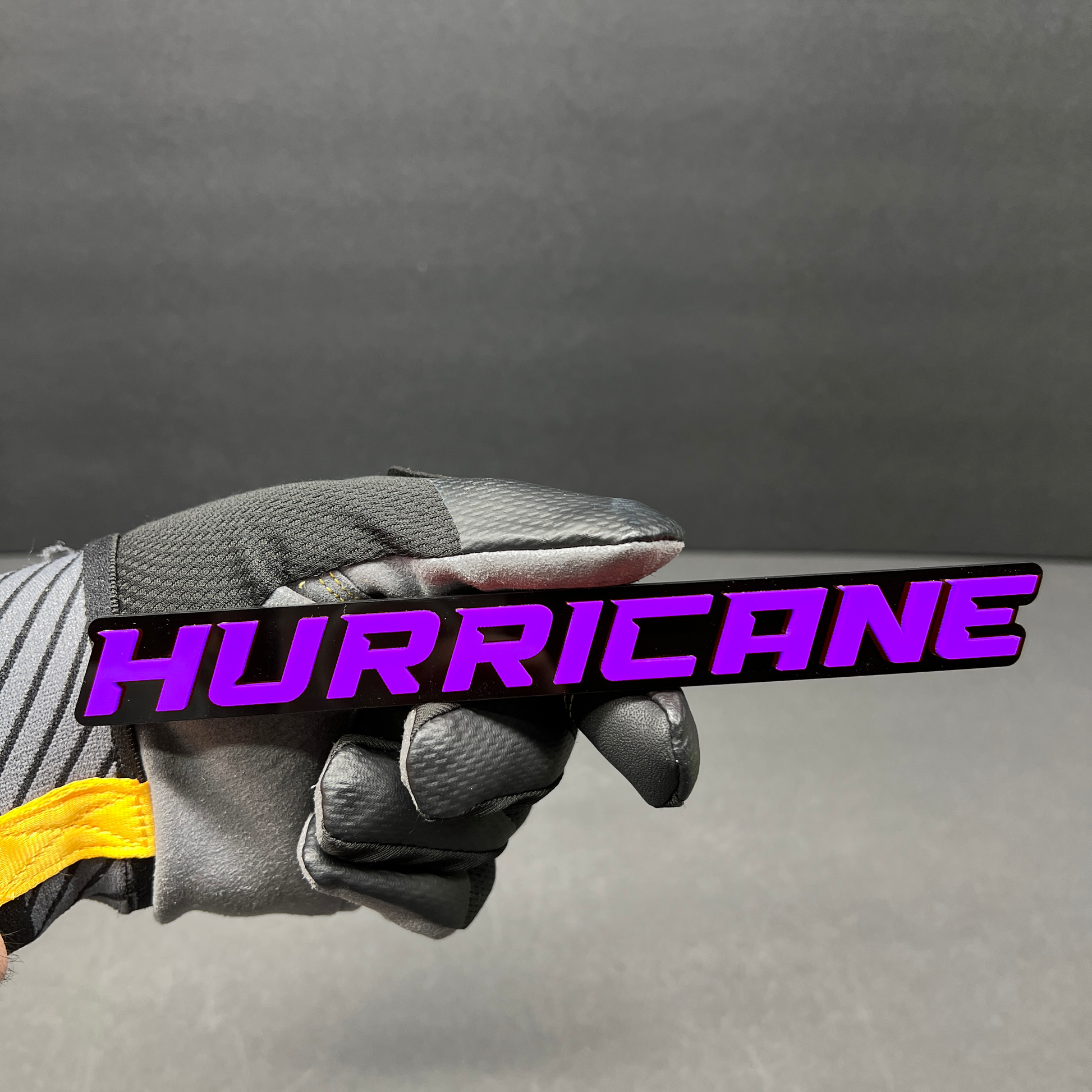 Personalized Hurricane emblem designed for automotive fenders and tailgates.