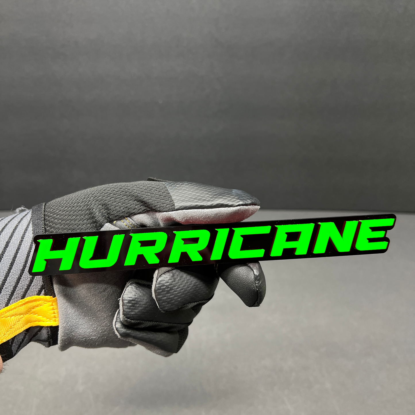 Hurricane personalized car emblem for truck or SUV exterior customization.