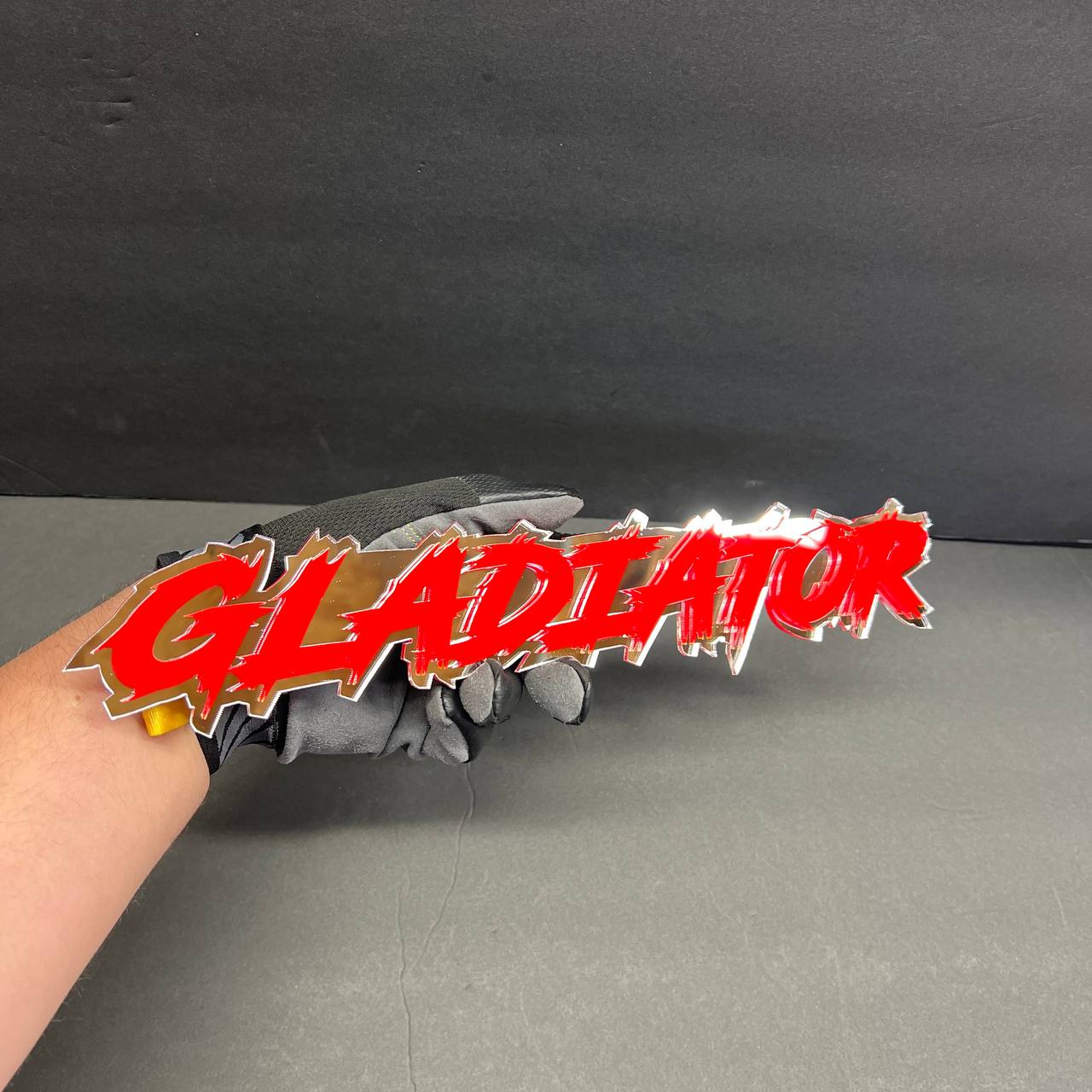 Red white GLADIATOR car badge fender emblem with bold rugged truck look.