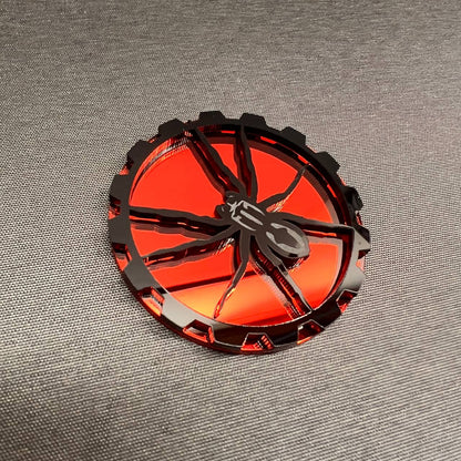lack Widow spider design badge in red and black for Jeep vehicles